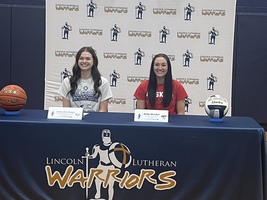 Jordan Ernstmeyer and Abby Walchal college signing