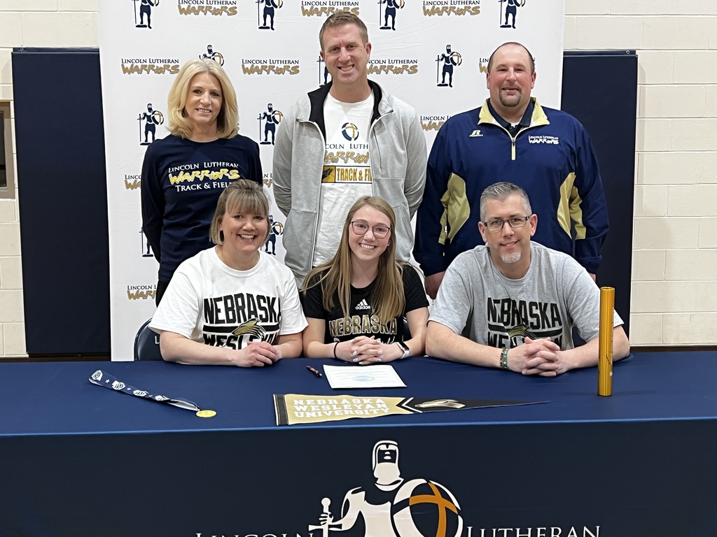 Kate Leimbach with family and coaches