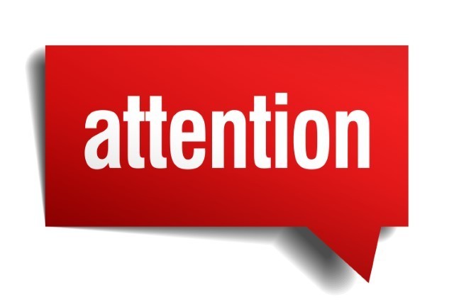 "Attention" on a red background